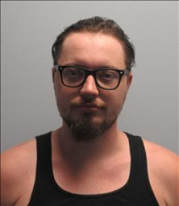 Justin Michael Sporing a registered Sex, Violent, or Drug Offender of Kansas